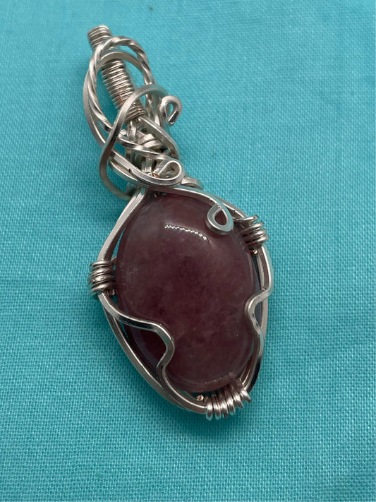 Silver pendant with strawberry quartz