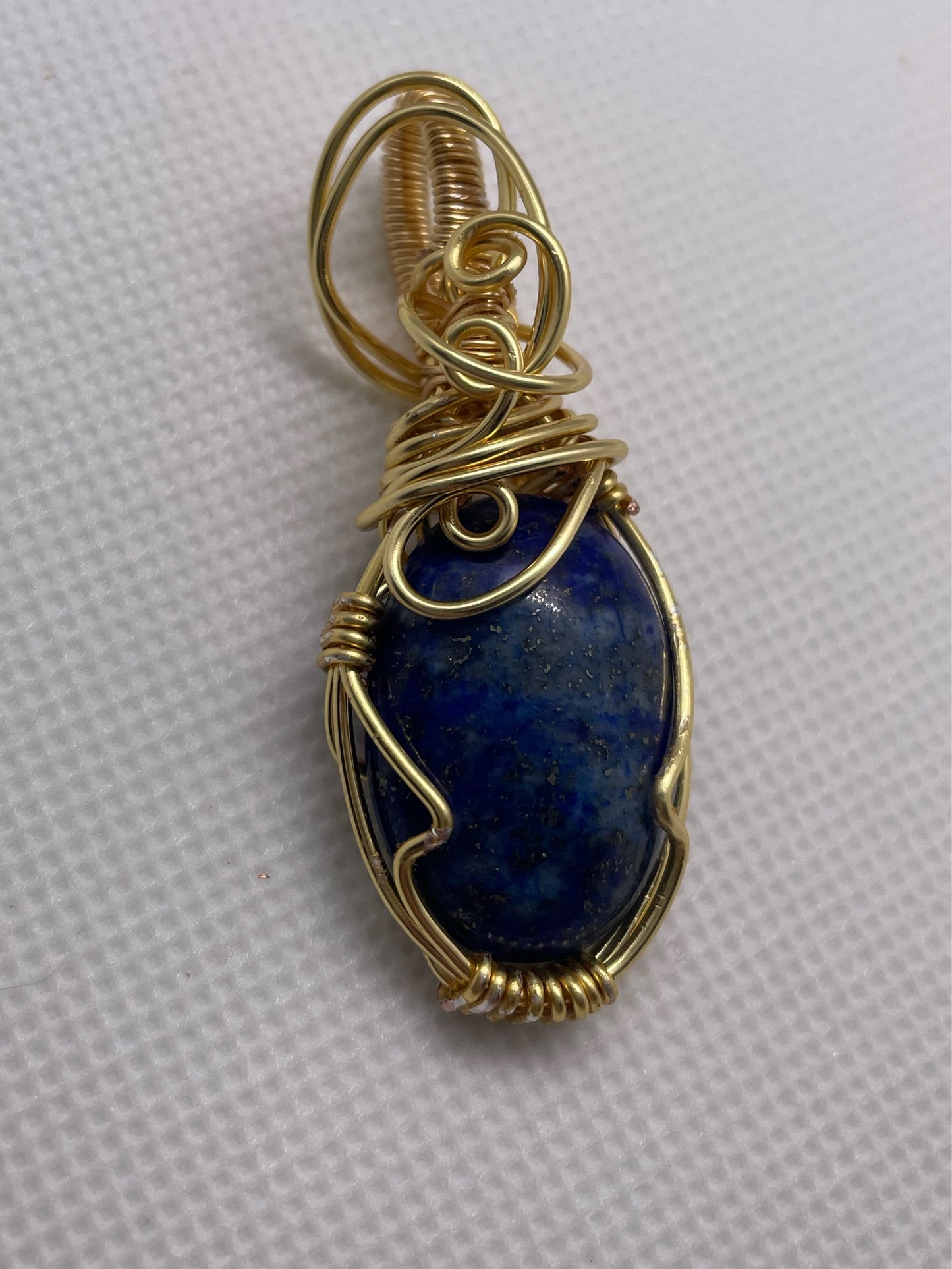 Silver pendant with lapis