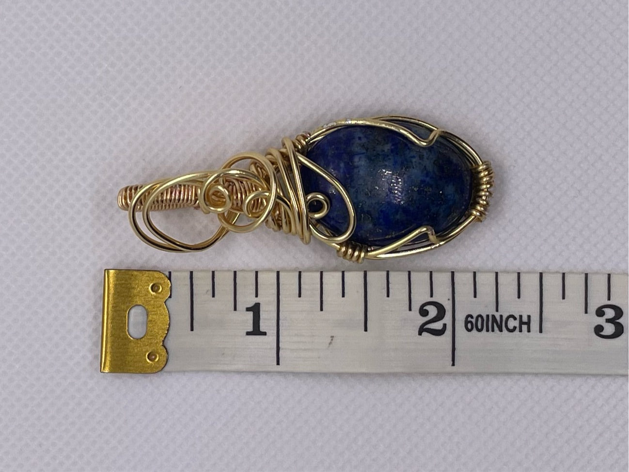 Silver pendant with lapis